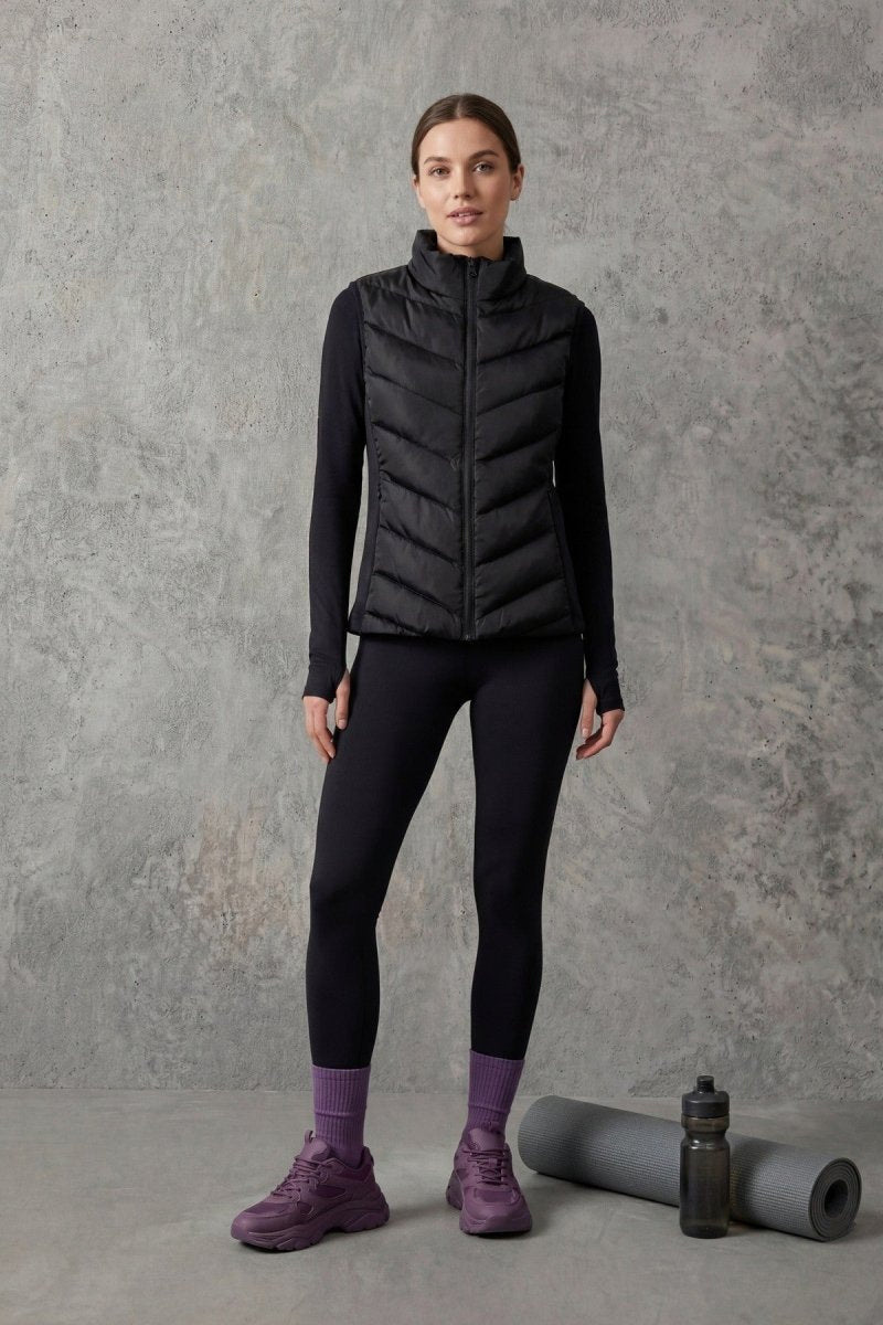 Siyah Kapitone Kolsuz Slim Fit Dik Yaka Fermuarlı Cepli Kadın Şişme Yelek MTLCY1 - MMETALIC